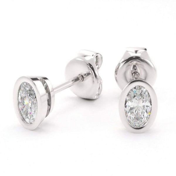 Full Bezel Set Oval Cut Diamond Stud Earrings.
